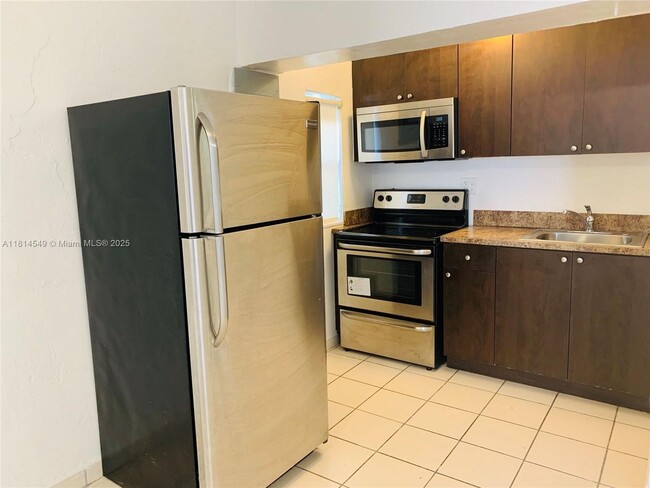 Building Photo - 619 NE 88th St Unit 2-2 Rental