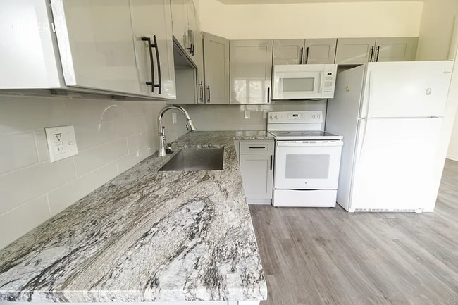 Photo - Beautifully Renovated, Spacious 4BR Home w/ Basement & Backyard!