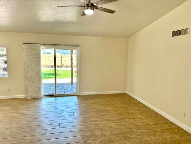 Photo - Beautifully updated Mesa home near Whitman Park with wood-look tile, fresh paint, vaulted ceiling...