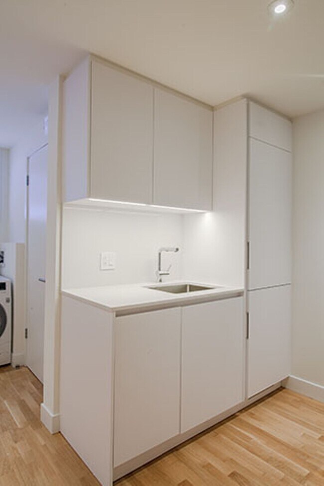 Photo - 25 Av des Pins O Unité 106