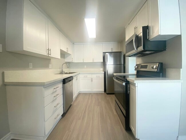 Building Photo - 5810 Amaya Dr Unit 14C