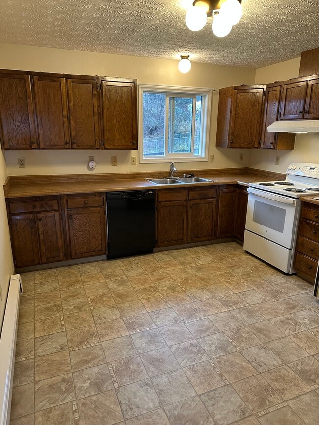 Photo - 6511 E 8th Ave Unidad #4