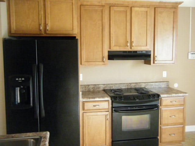 Photo - Charming 3BR/2BA Home with Open Floor Plan, Vaulted Ceilings & 2-Car Garage