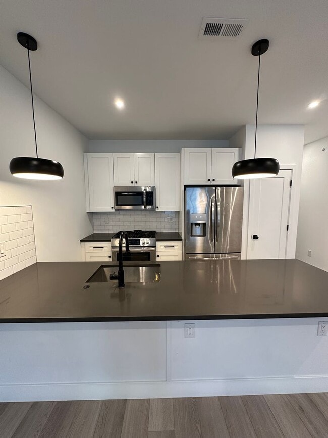 Photo - ONE FREE MONTH RENT: 3 bedroom 3 bath Newer construction home offers perfectly blends comfort, st... Unit 2