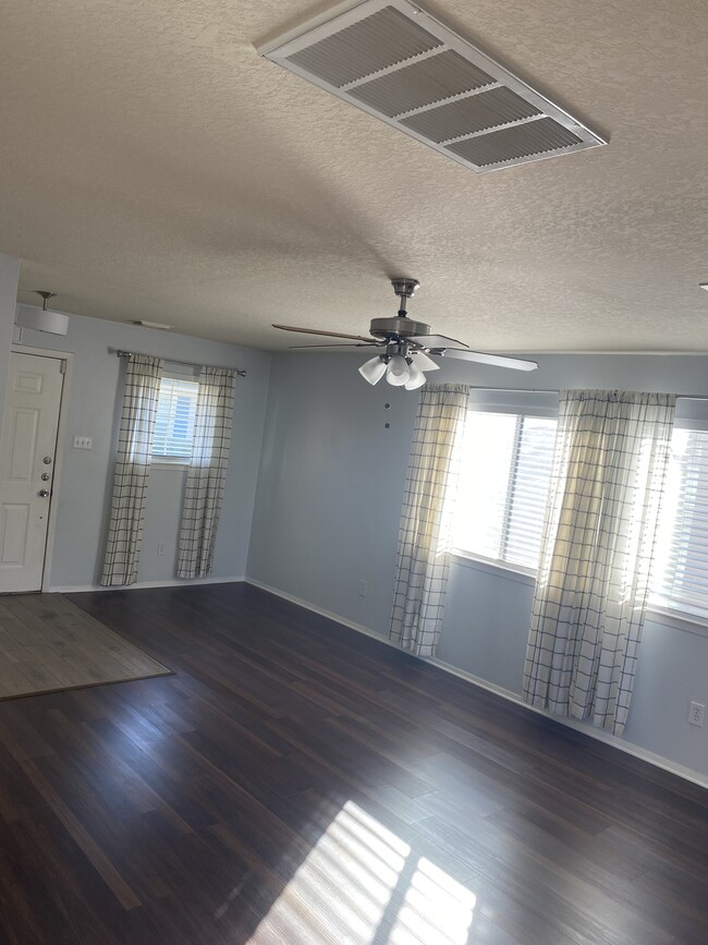 View of front entrance and living room - 6249 Lone Prairie Way