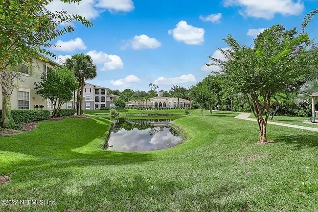 Lake near the building - 3591 Kernan Blvd S Unit #404