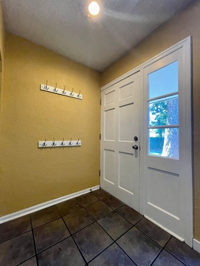 Photo - Updated Ranch with Large Fenced Yard, Tucked Off Walker Road~ Gas Fireplace~ Great Natural Light~...