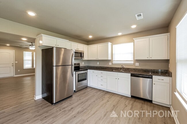 Photo - 3 BR/2.5BA | Newly Renovated Single Family Home | 1-Car Covered Parking | Community Pool!