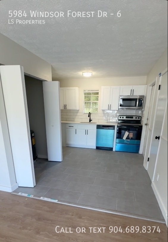 Building Photo - 5984 Windsor Forest Dr Unit 6