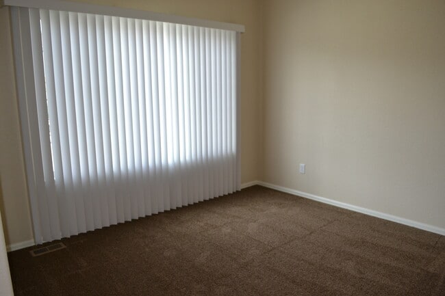 Photo - 4 Bedroom Home w/ a 3 Car Tandem Garage!