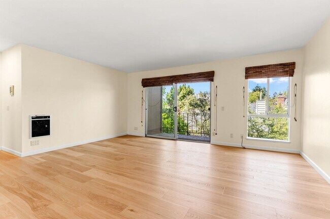 Photo - Modern Oakland Living: New Floors, Private Balcony, and Parking