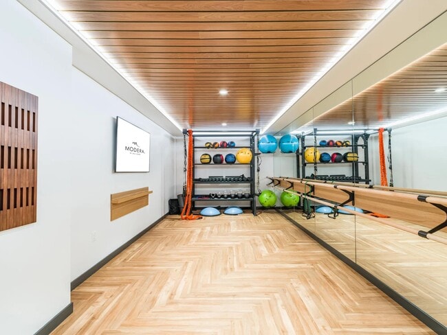 Find your center at Modera Northgate with a serene yoga and wellness studio, offering the perfect space to recharge and unwind in the comfort of your own home.