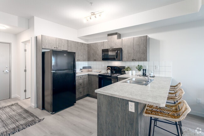 1 chambre, 1 salle de bain avec bureau - 672 pi² - Cuisine - Timber Pointe Apartments