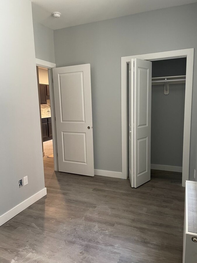 Photo - Bright & Spacious 3-Bedroom Apartment with In-Unit Washer/Dryer | Heat & Hot Water Included | Nea... Unit 1