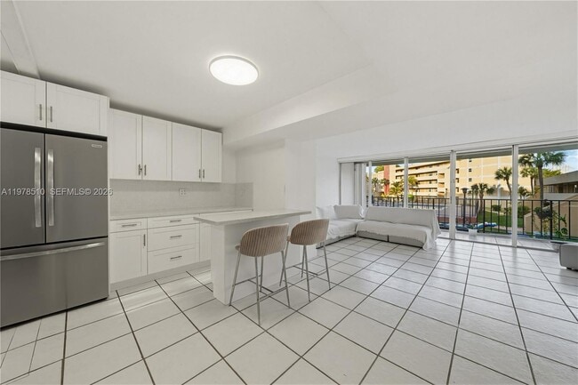 Building Photo - 9210 Fontainebleau Blvd Unit 207