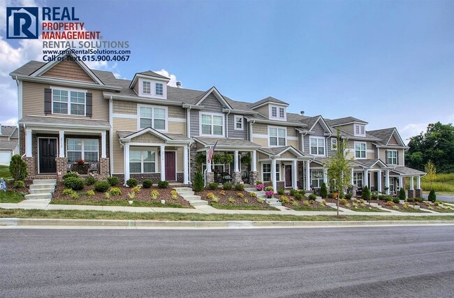 Photo - Wonderful townhome 15 min. to downtown Nashville- pool, tennis courts & fitness center!