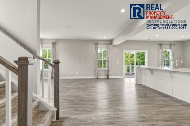 Photo - Great 4 bd 2.5 ba with attached garage and large deck!