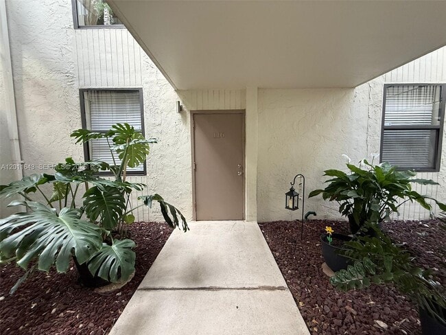 Building Photo - 20441 NE 30th Ave Unit 116-9