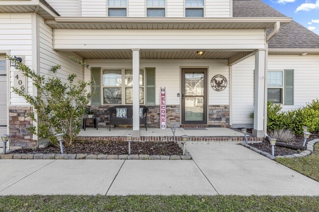 Photo - 3 Bedroom + Bonus Room Home with Main Floor Primary Suite & Community Pool Access
