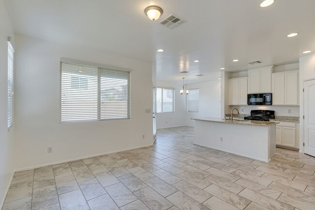 Building Photo - Bright & Stylish 3-Bedroom Home with Low-Maintenance Backyard