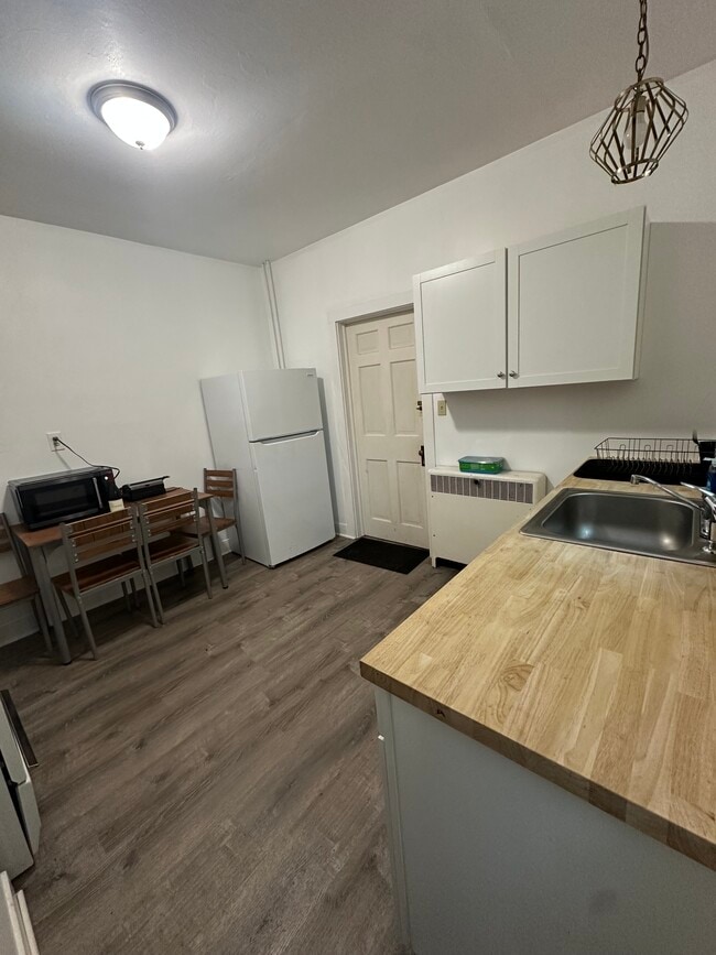 Downstairs Apartment- Back entrance & Kitchen - 50 Main St