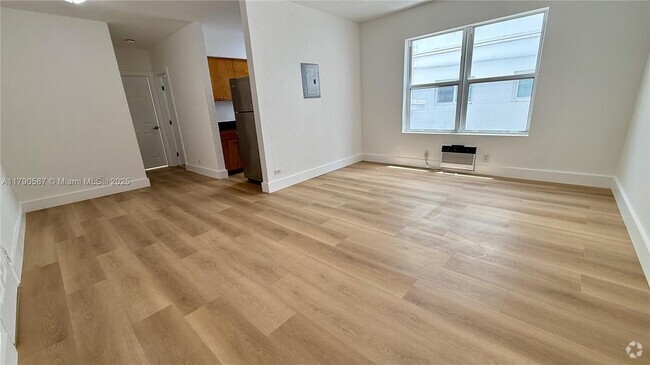 Building Photo - 7334 Harding Ave Unit 3 Rental