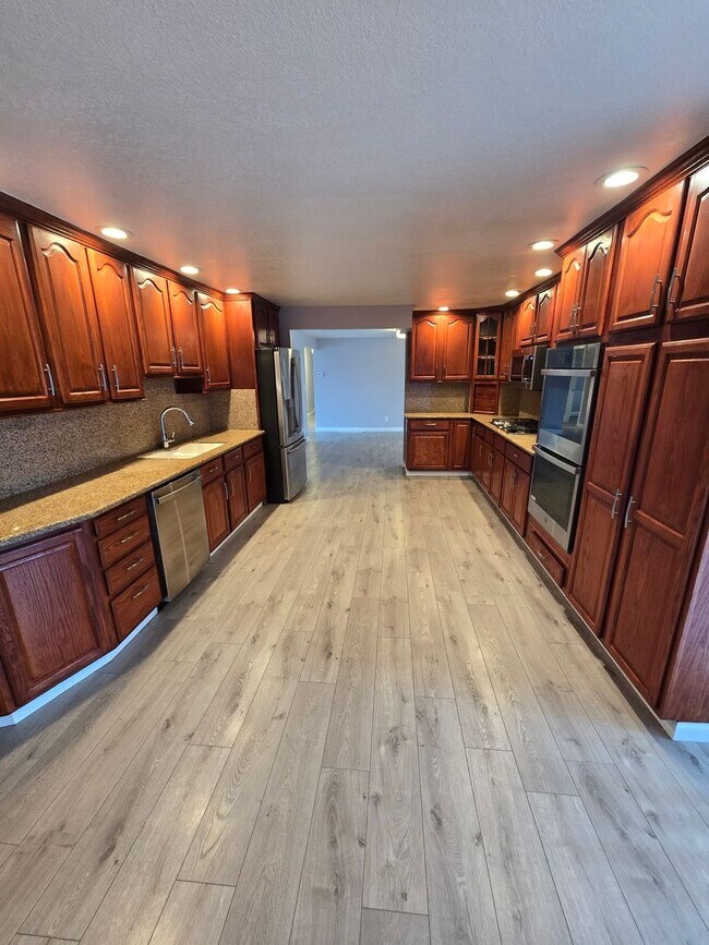 Photo - HUGE Bonus room ! Remodeled !  Hardwood Flooring Throughout & New Carpet in Bedrooms, Tile, Grani...