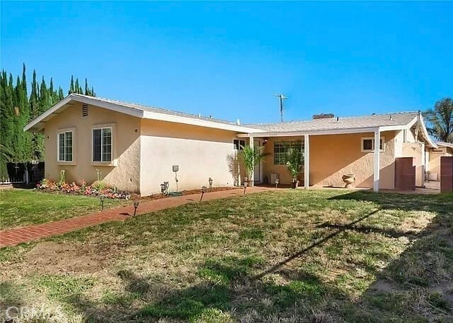 Building Photo - 17256 Rinaldi St Rental