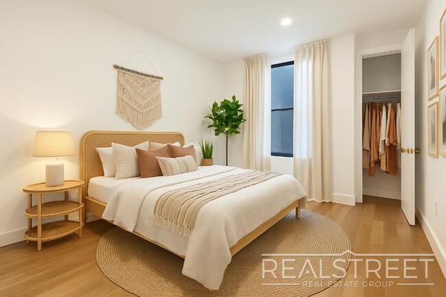 Photo - Modern Renovated 2BR with Skylight & Private Balcony in Prime Crown Heights