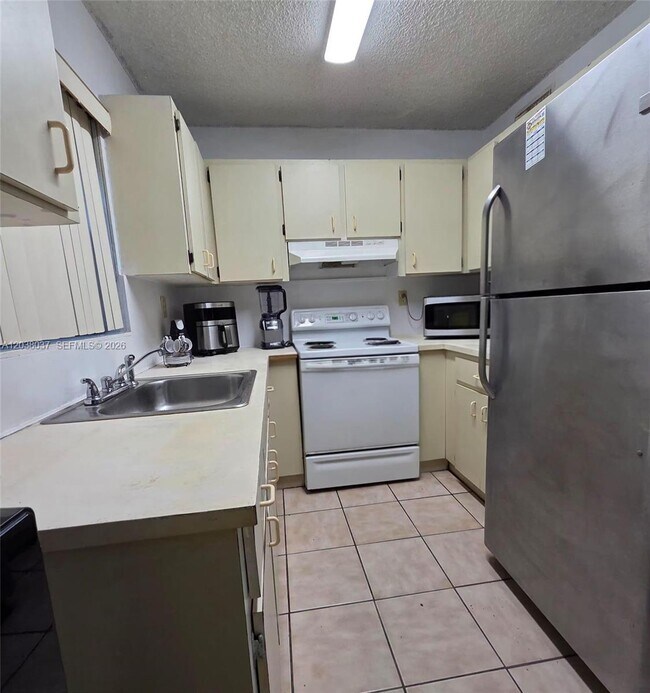 Photo - 2560 W 60th St Unit 104