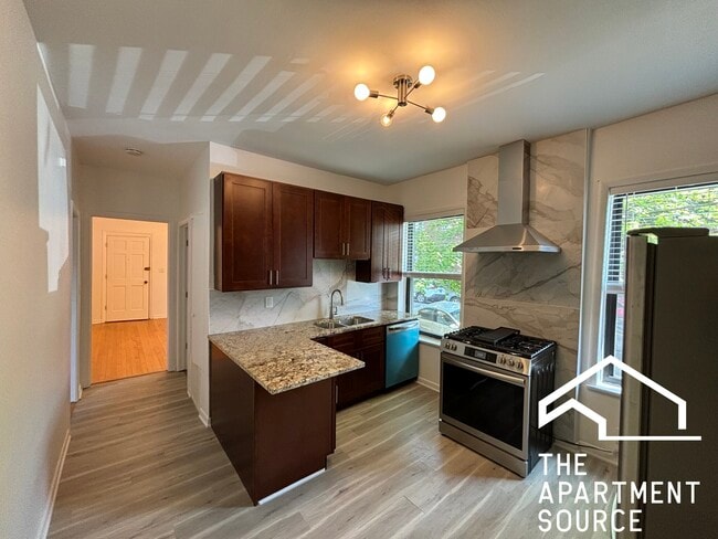 Building Photo - 3138 W Schubert Ave Unit 1F