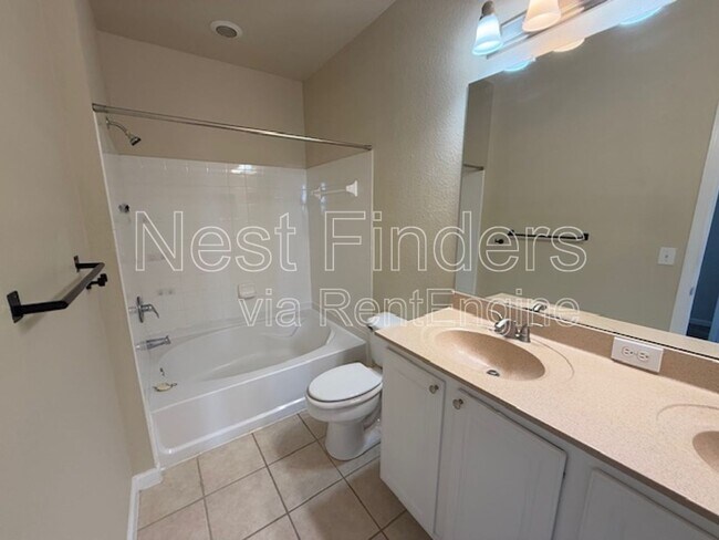 Photo - 10075 Gate Pkwy N Unidad 1606