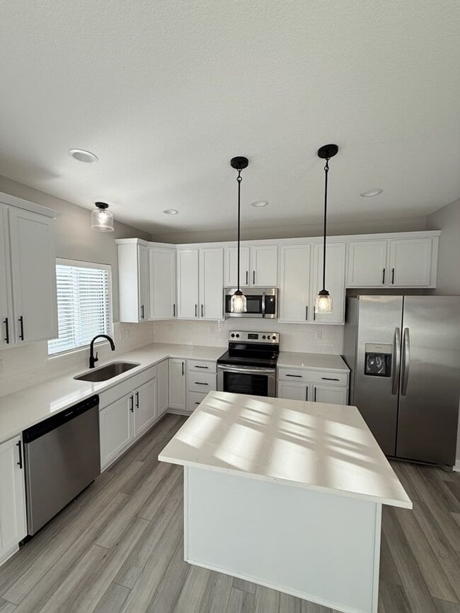 Photo - Spacious 4-Bedroom Home with 2-Car Garage & Yard