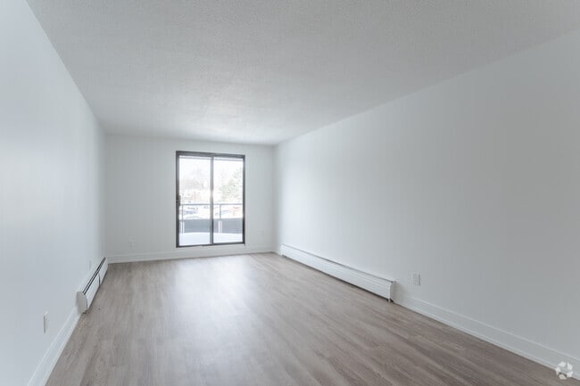 2BR, 1BA - 924SF - Living Room - 139 Christopher Drive,205 & 215 Champlain Blvd
