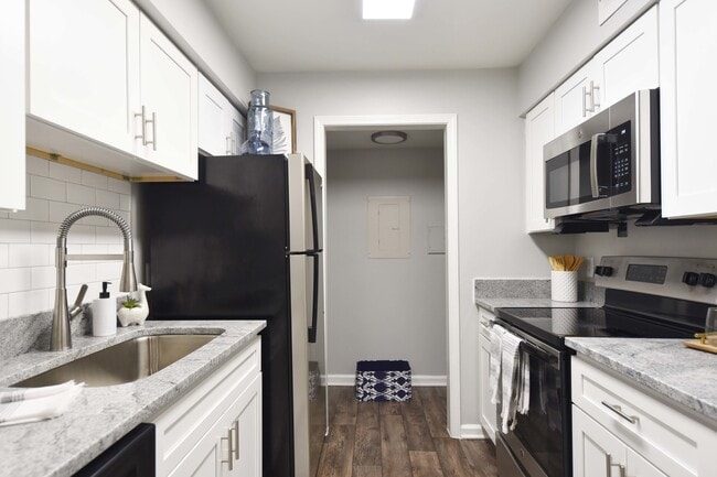 Kitchen with granite counters and stainless appliances