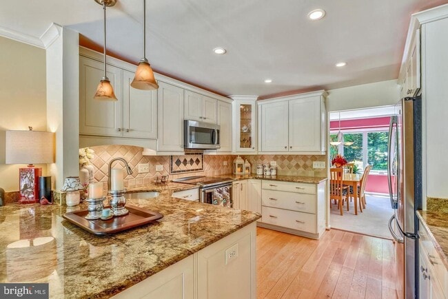 Photo - Experience elevated living in this beautifully renovated townhome nestled within the highly sough...