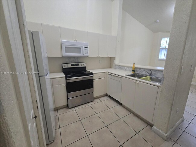 Photo - 1661 SE 28th St Unit 203