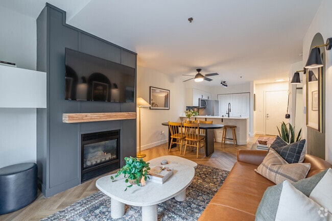 1BR, 1BA - 656SF - Living Room, Dining, and Kitchen - Novi at Queen Anne