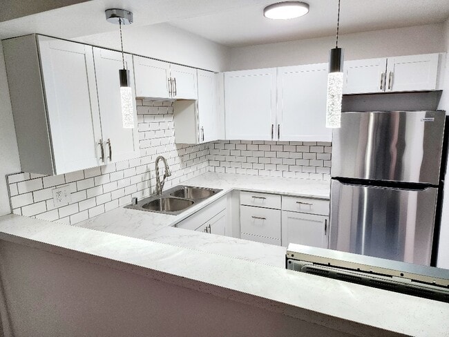 Building Photo - 5675 W Brown Deer Rd Unit 210