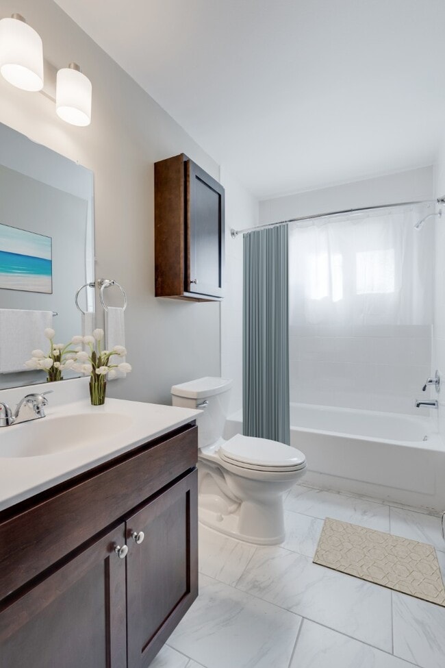 Elevate your lifestyle at St. Anthony Group, where stylish interiors and modern amenities await. This stunning bathroom features elegant finishes and spacious designs, perfect for your daily retreat. Schedule a tour today and see for yourself!