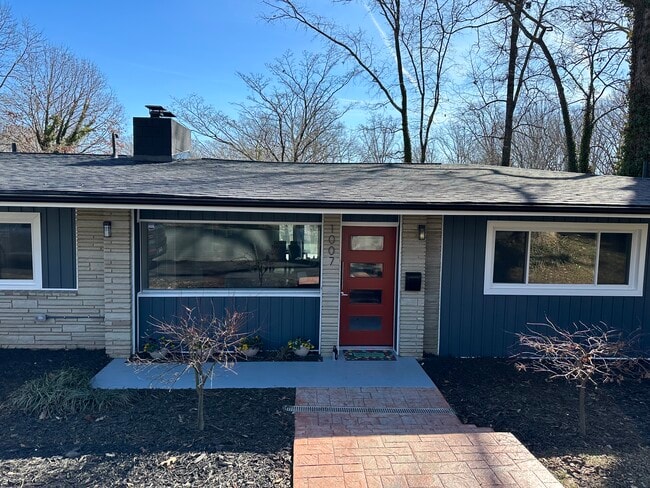 Main property view. Apartment entrance off back patio. - 1007 N Peace Haven Rd