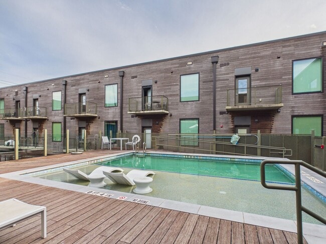 Building Photo - Modern East Austin Condo with City Views & Unmatched Walkability