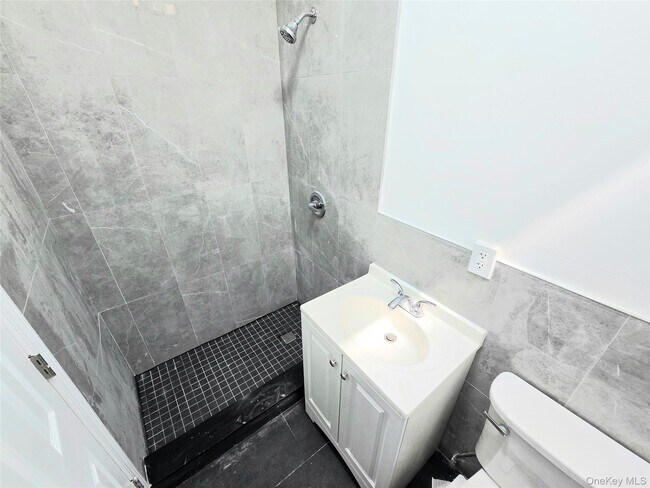 Photo - 56-46 Myrtle Ave Unit 3