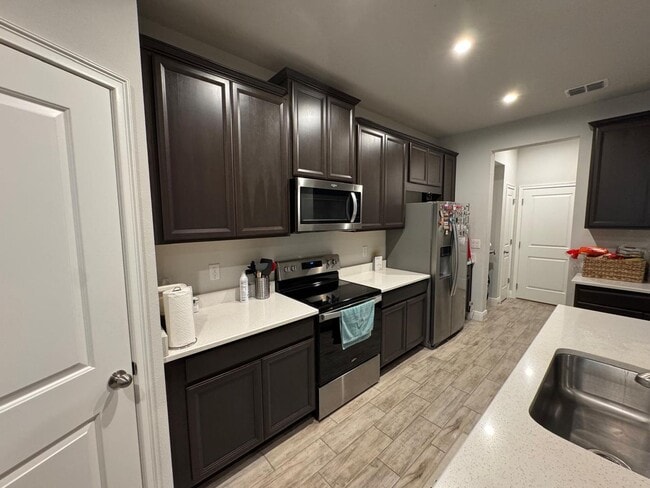 Photo - Beautifully maintained 3-bedroom, 2.5-bath...