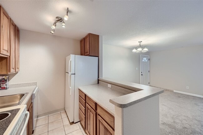 Photo - Top-floor, 2-bed 1-bath condo located near the highly desirable Old Town Arvada! Unit 301