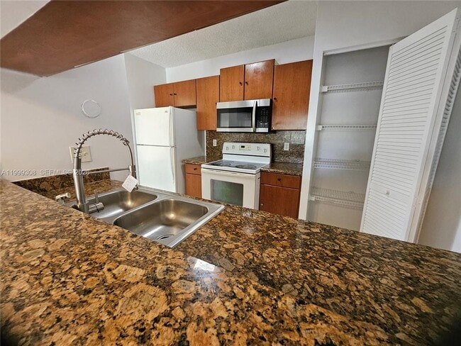 Photo - 11582 NW 44th St Unidad 11582 NW 44th St, Coral Springs, FL 33065