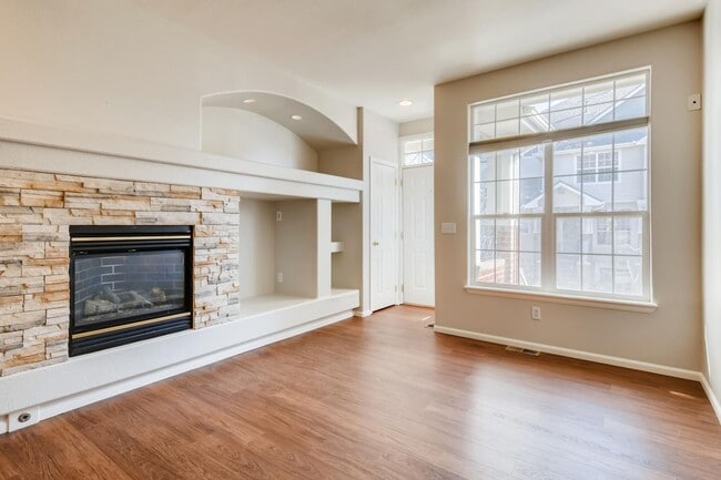 Photo - Stunning 3-bed 3-bath townhome that features hardwood floors and an attached 2-car garage!