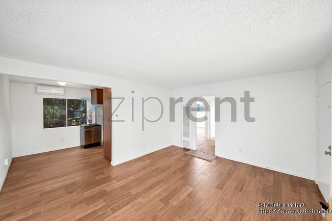 Building Photo - 2458 Normandie Ave