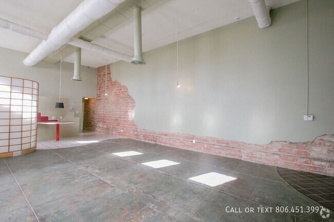 Building Photo - Utilities Included - Nice, Large Loft Loca... Unit A