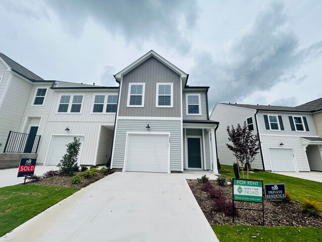 Photo - Stunning new end-unit 3 bedroom 2.5 bath townhouse in N High Point with attached garage.